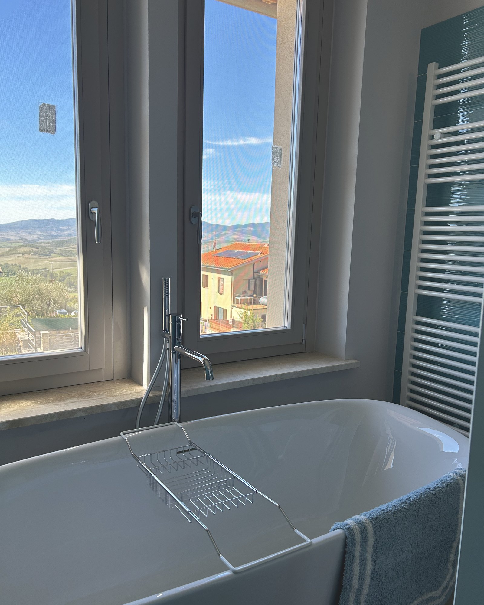 The ensuite bathroom with freestanding tub